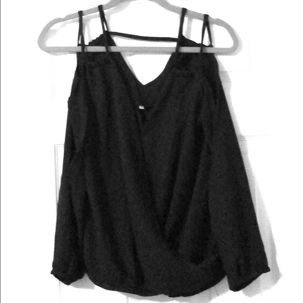 Black cold shoulder top. Never worn!